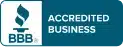 A blue and white "BBB Accredited Business" logo with a torch icon on a dark blue background.