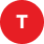 A blurry red circle with a white capital letter "T" in the center.